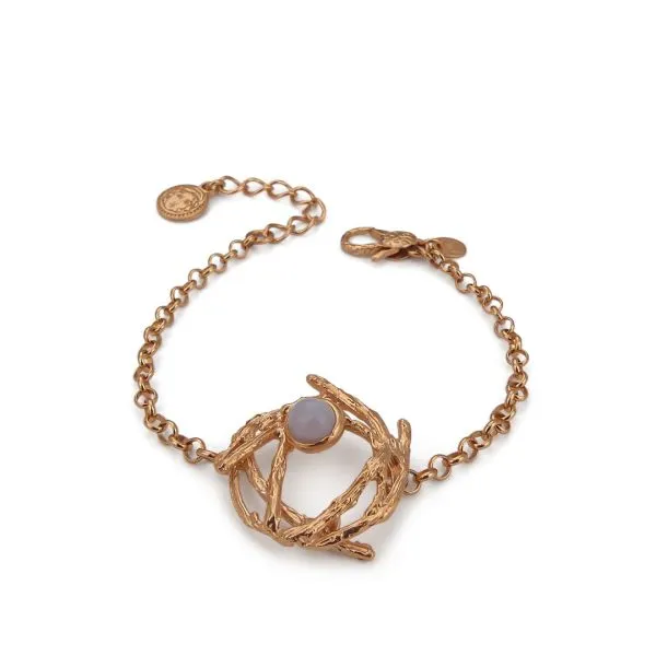 Bracciale con intreccio centrale e cabochon di quarzo rosa    
