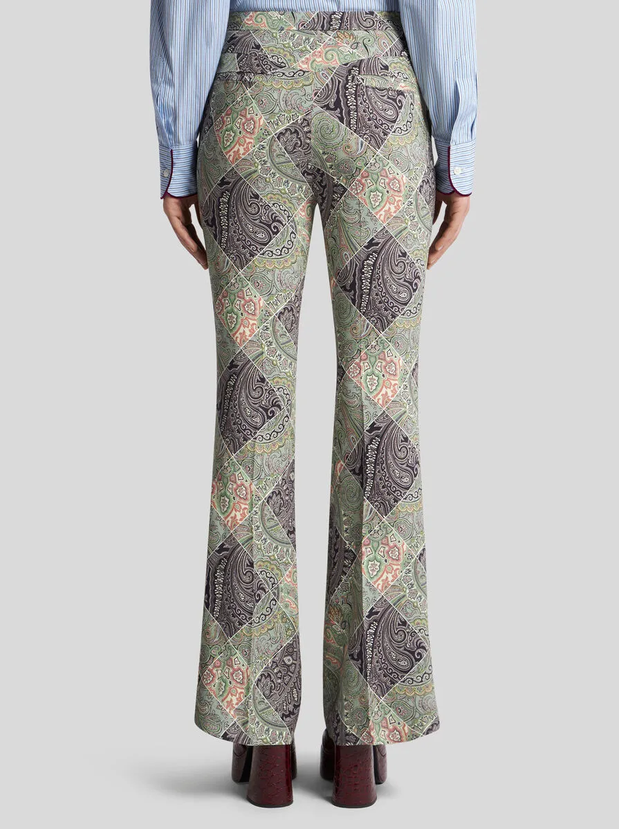 PANTALONI FLARE IN CADY STAMPATO