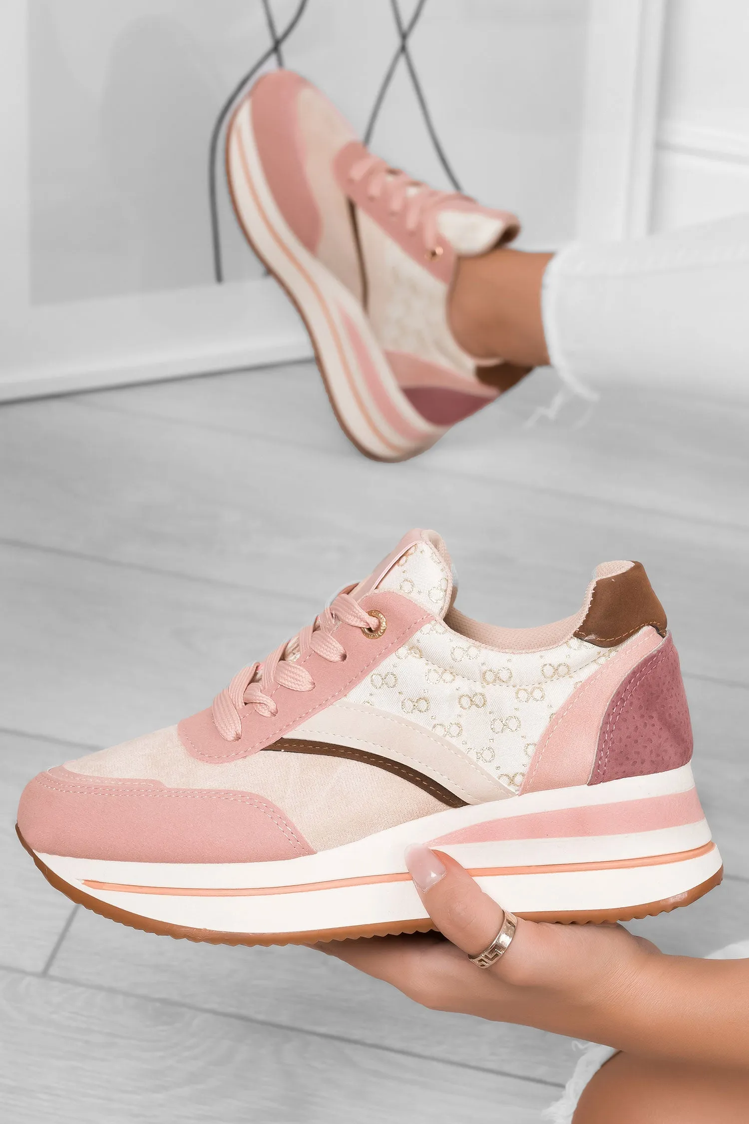 Sneakers rosa con suola alta