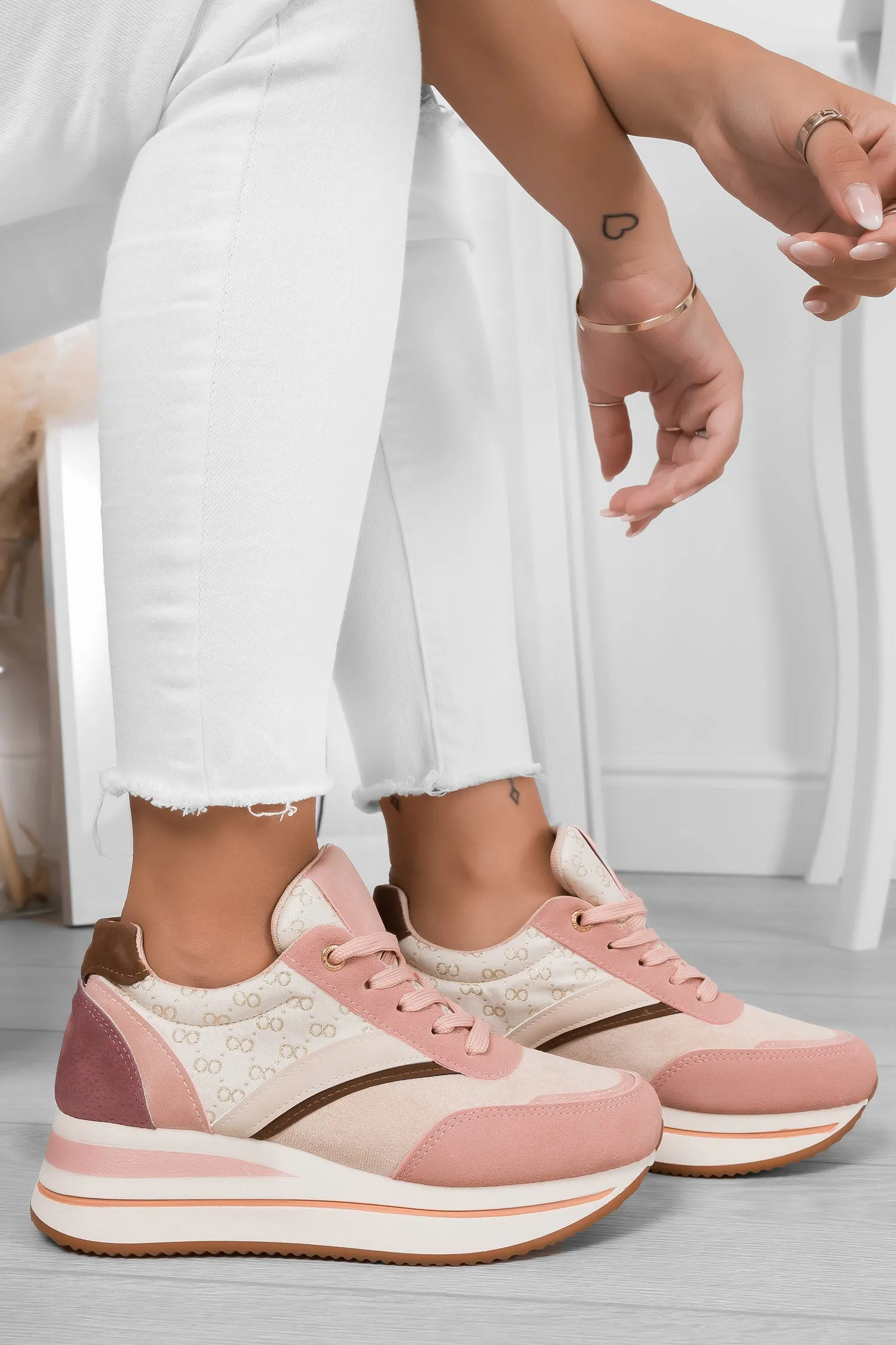 Sneakers rosa con suola alta