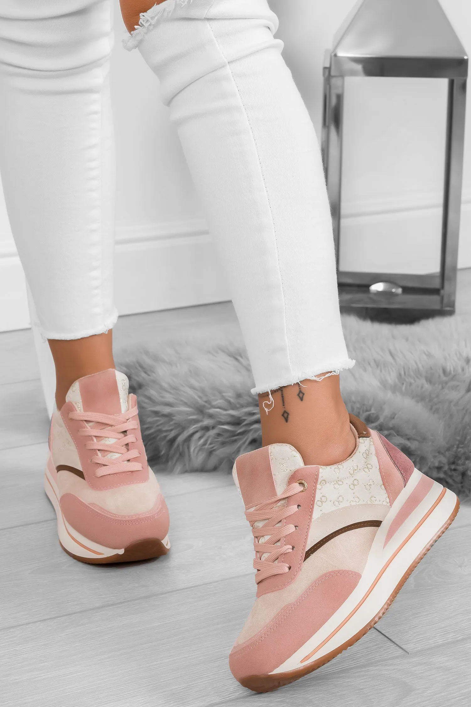 Sneakers rosa con suola alta